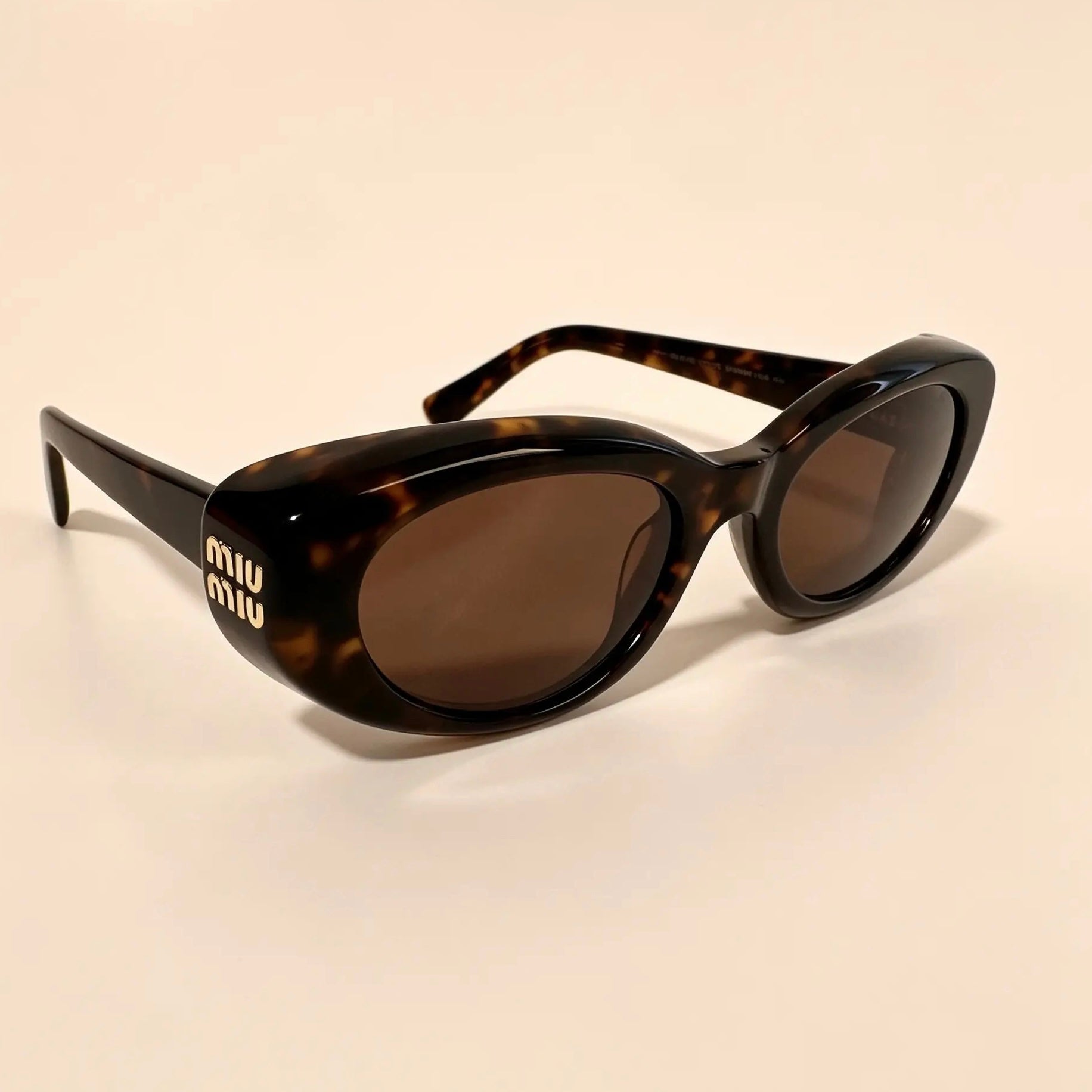 Lentes de sol MIU MIU